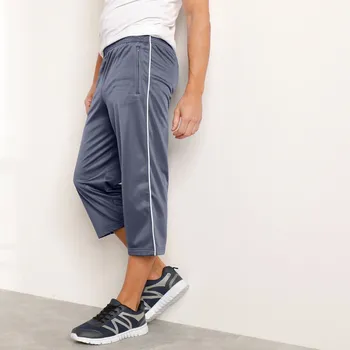 Dámské kalhoty 3/4 sportovní kalhoty z mikrovlákna šedá 52/54