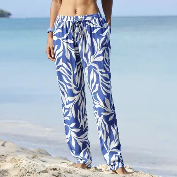 Dámské kalhoty Rovné kreponové kalhoty s potiskem modrá/režná 44