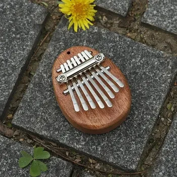Hudební nástroj pro děti Mini kalimba s jemným zvukem do kapsy | hudební nástroj, kalimba přívěsek - Kapka vody
