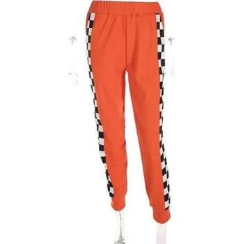 Dámské oranžové kostkované tepláky se zipem M