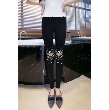 Dámské džíny Dámské moderní džíny s manžetovými diamanty - Černé S