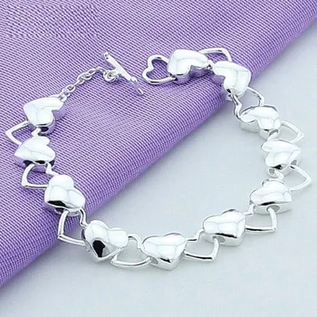 Náramek Dámský náramek se srdci na americké zapínání