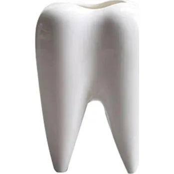 Dekorativní květináč ve tvaru zubu