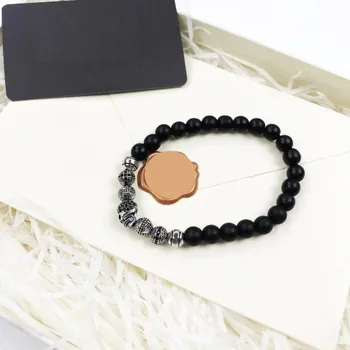 Náramek Dámský korálkový náramek s lebkou 20 cm