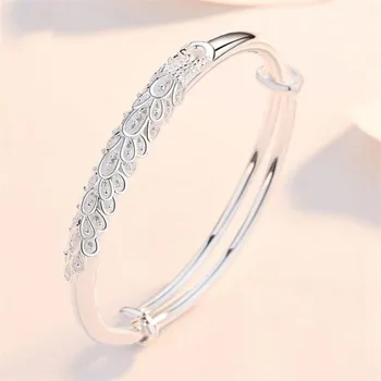 Náramek Dámský pevný náramek s pávem