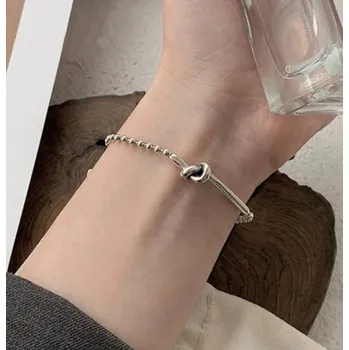 Náramek Dámský náramek s uzlem