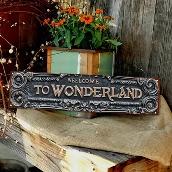 Plechová cedule BAF Kovová cedule Wonderland. 40 x 10 cm