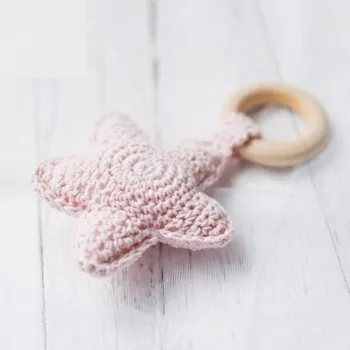 Hračka pro nejmenší Závěsná hračka hvězda růžová