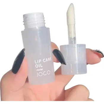 Lesk na rty Bezbarvý hydratační skleněný lesk na rty Intenzivní lesk a hydratace Jemné a hebké rty Lesk bez lepivosti Přirozený vzhled na rty Coconut Milk