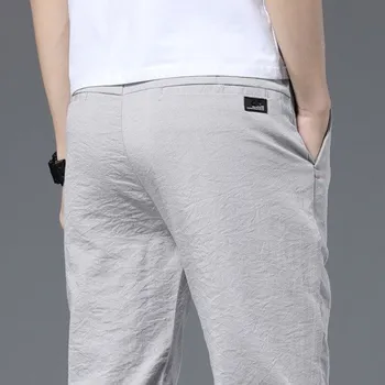 Pánské kalhoty Pánské kalhoty F1635 světle šedá 29