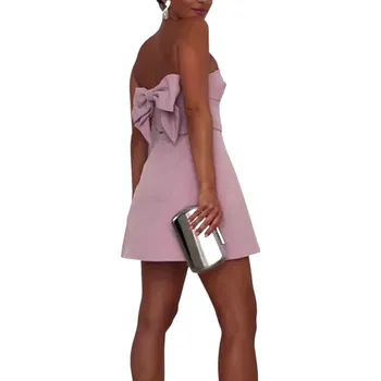 Dámské šaty Růžové minišaty bez ramínek Elegantní slavnostní šaty s velkou mašlí na zádech Krátké šaty do společnosti Večerní outfit M