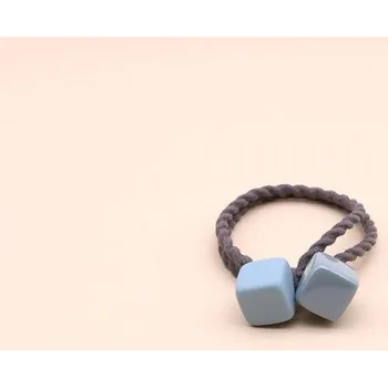 Gumička do vlasů s kostkami modrá