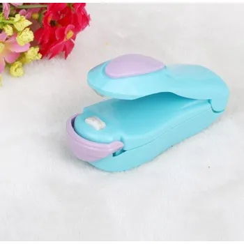 Pomocník do kuchyně Mini těsnící stroj J2921 tyrkysová