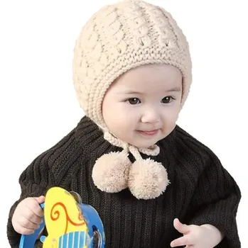 Pokrývka hlavy Dětská zimní čepice s bambulkami J1241 béžova