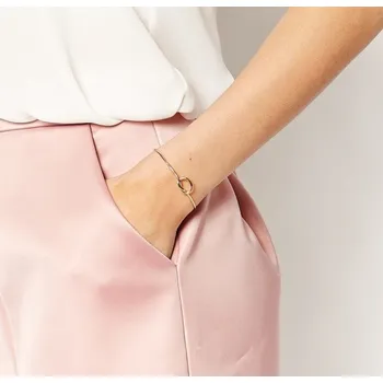 Náramek Elegantní dámský náramek Uzel