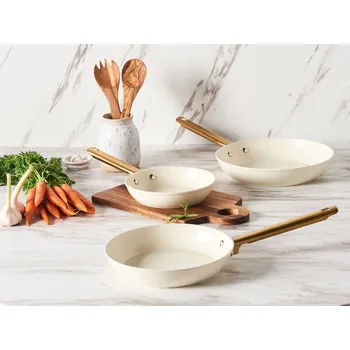 Pánev Sada 3 pánví krémově bílý hliníkový keramický povrch s nepřilnavým povrchem a rukojeťmi ve 3 velikostech Beliani