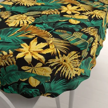 ubrus Bavlněný oválný ubrus Sandra SA-603 Zeleno-zlaté tropické listy na černém 60x100 cm