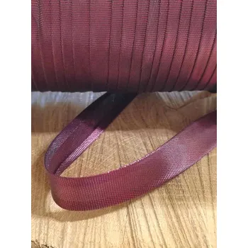 Šikmý proužek lurexový šíře 15 mm zažehlený bordo