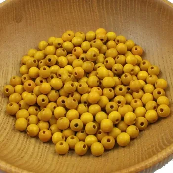 Korálek Korálky dřevěné oranžové pr. 7 mm - bal. 20 ks