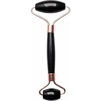 Masážní přístroj Obsidián černý masážní váleček barva růžového zlata délka cca 14,5 cm