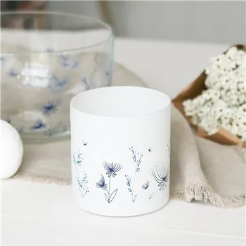 Svícen Skleněný svícen s dekorem květin