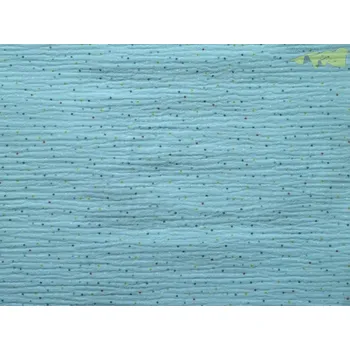 bledě modrý mušelín s tečkami