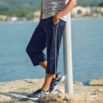 Dámské kalhoty 3/4 sportovní kalhoty z mikrovlákna nám.modrá 52/54