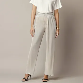 Dámské kalhoty Široké plisované kalhoty zlatá 46/48