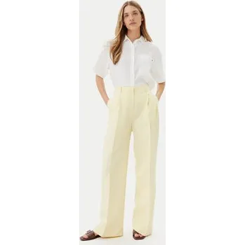 Dámské oblečení Tommy Hilfiger Kalhoty z materiálu WW0WW45460 Žlutá Relaxed Fit 42