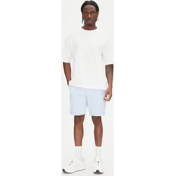 Pánské kraťasy Tommy Jeans Šortky z materiálu Scanton DM0DM21950 Světle modrá Slim Fit 36