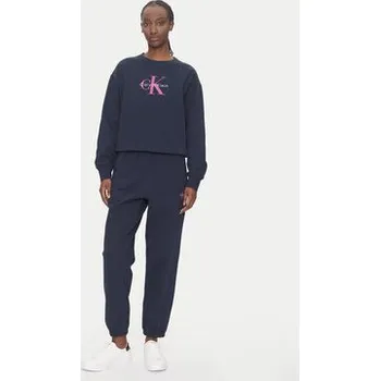 Dámské kalhoty Calvin Klein Jeans Teplákové kalhoty Monologo LV047B235G Tmavomodrá Regular Fit S