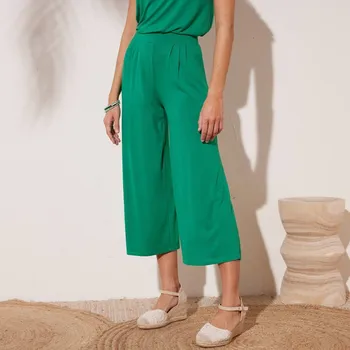 Dámské kalhoty 7/8 široké jednobarevné kalhoty s pružným pasem zelená 46/48