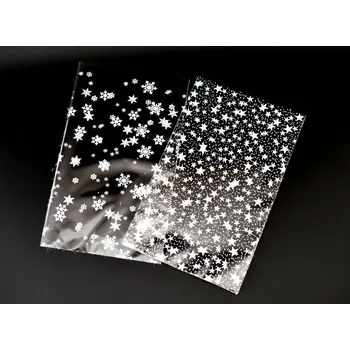 Potravinová fólie Kala dekorace s.r.o. Vánoční celofánové sáčky s potiskem 15 x 25 cm VLOČKY