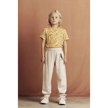 Chlapecké kalhoty Dětské bavlněné tepláky Mini Rodini Bird 2563011111 béžová 01X, vel. 92-98