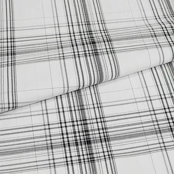 Kostýmovka bílá, černé káro, lurex, š.145