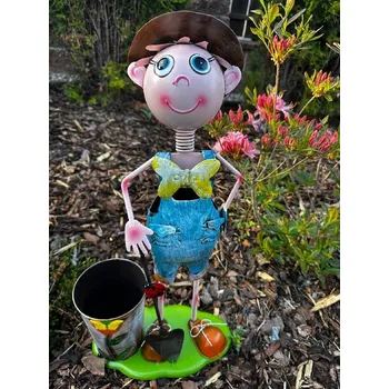 Zahradní dekorace Prodex Import Plechový panák s květníkem