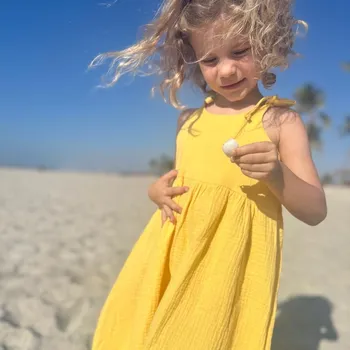 Dívčí šaty Dětské mušelínové šaty na ramínka / žluté Velikost: 104/110