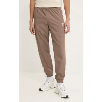 Tepláky adidas Originals Firebird béžová barva, s aplikací, JP1024 80X, vel. XXL