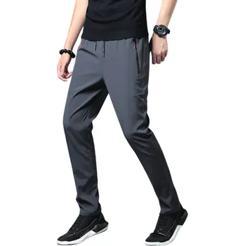 Letní pánské rychleschnoucí kalhoty sportovní slim fit kalhoty na běhání turistiku trénink Prodyšné tenké kalhoty do teplého počasí šedá M