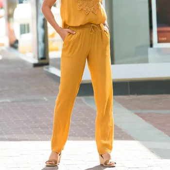 Dámské kalhoty Jednobarevné rovné kreponové kalhoty šafránová 52
