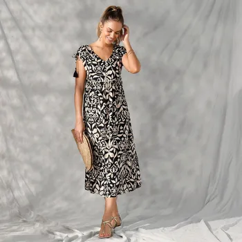 Dámské šaty Midi šaty s potiskem černá/béžová 44