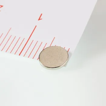 Dekorativní magnet Magsy Neodymový magnet válec pr.6x0,7 N 80 °C, VMM4 Počet kusů: 1 ks