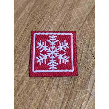 Textilní nažehlovací páska Nažehlovačka vločka barva červená