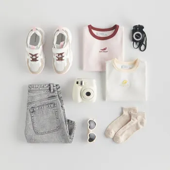 Dívčí oblečení Reserved - Bavlněné tričko s aplikací - krémová - 571EX-01X - 571EX-01X-U13