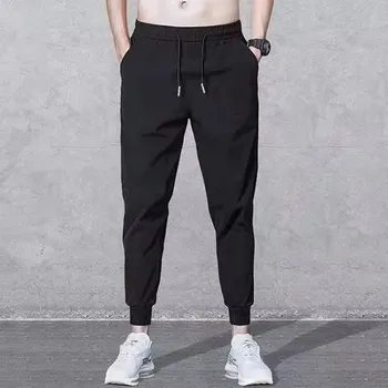 Pánské teplé kalhoty s fleecem – zimní volný střih, zip a kapsy Velikost: 4XL, Barva (Varianta): [Solid Barva leather rope pants] Thin