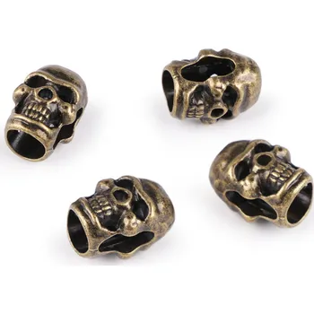 Kovová koncovka na šňůru Ø5 mm / ozdoba lebka, barva 5 staromosaz
