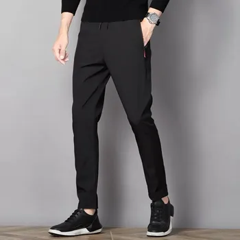 Pánské kalhoty Pánské sportovní kalhoty s kapsami a zipem Barva: Černá, Velikost: 5XL