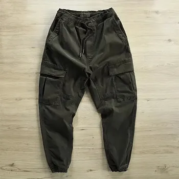 Pánské kalhoty Pánské teplákové kalhoty s kapsami ve stylu cargo Barva: Zelená, Velikost: M