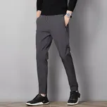 Pánské sportovní kalhoty s kapsami a zipem Barva: Šedá, Velikost: 5XL