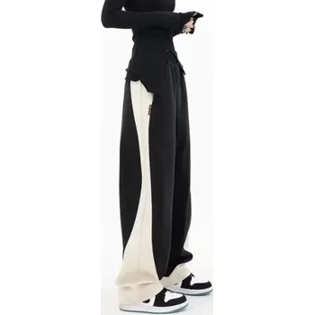 Dámské kalhoty Dámské harémové kalhoty s volným střihem Barva: Aprikotová, Velikost: XL